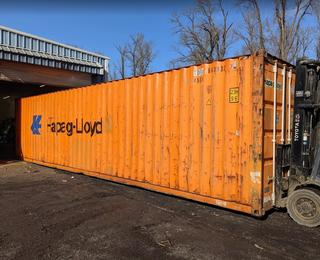 40 foot storage container going into shop
